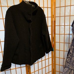 Silhouette black wool topper coat.